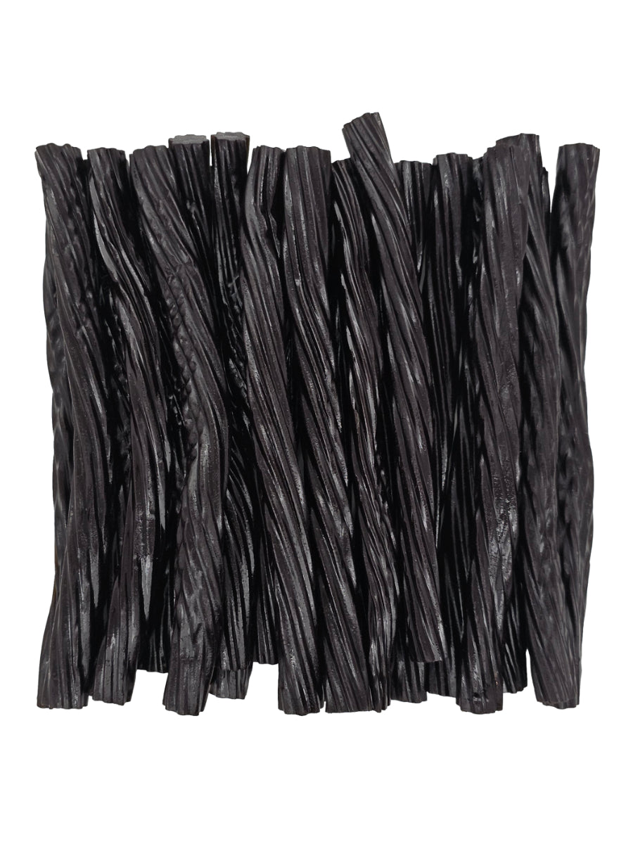Black licorice twists neatly arranged together.