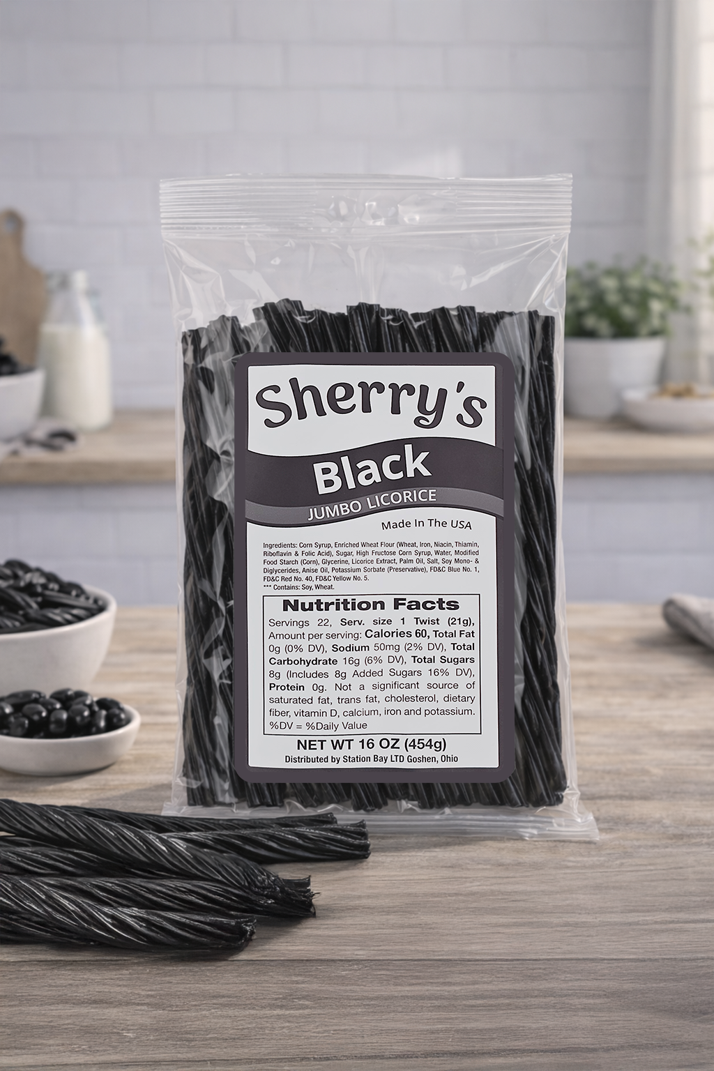 Packaged black licorice sticks with Sherry's Licorice Black label on a wooden surface.