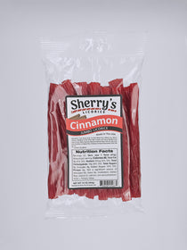 Packaged cinnamon with Sherry's Licorice label on a white background