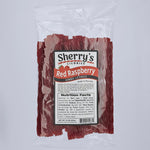 Packaged red raspberry licorice with Sherry's Licorice label on a white background