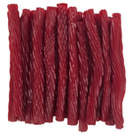 Red raspberry licorice twists neatly arranged together.