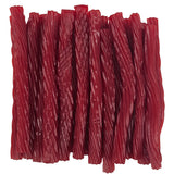Red raspberry licorice twists neatly arranged together.