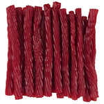 Strawberry licorice twists neatly arranged together.