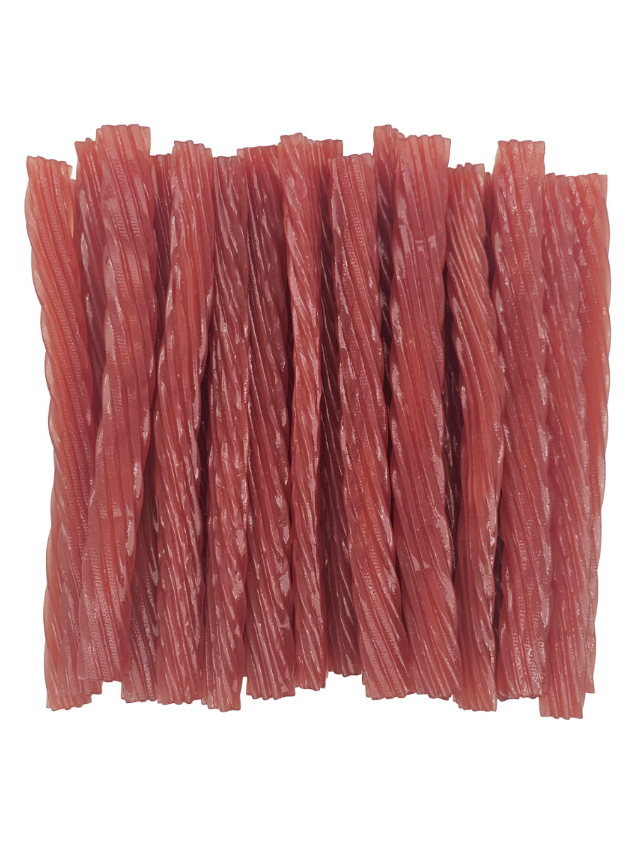 Watermelon licorice twists neatly arranged together.